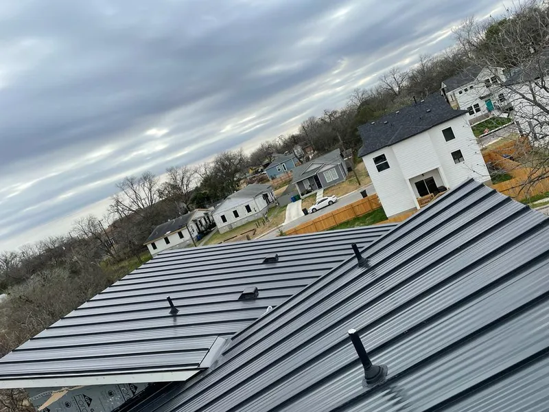 Standing seam metal roof panels with vents for Skylight Repair in Seward